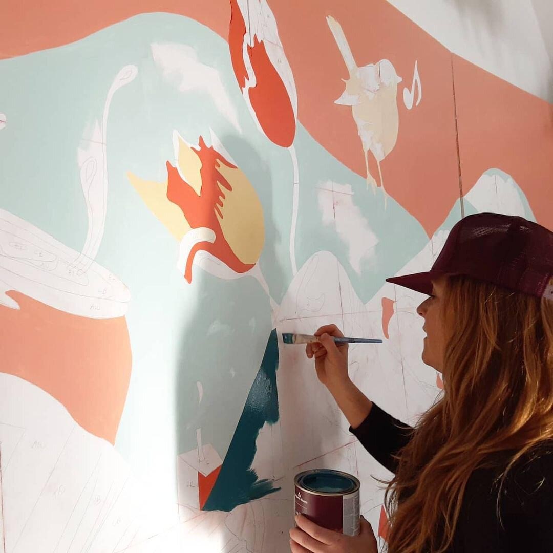 Jess Graham painting mural